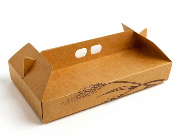 Caja de cartón kraft abierta para productos de panadería, con asas troqueladas y dibujo de espiga de trigo, sobre fondo blanco